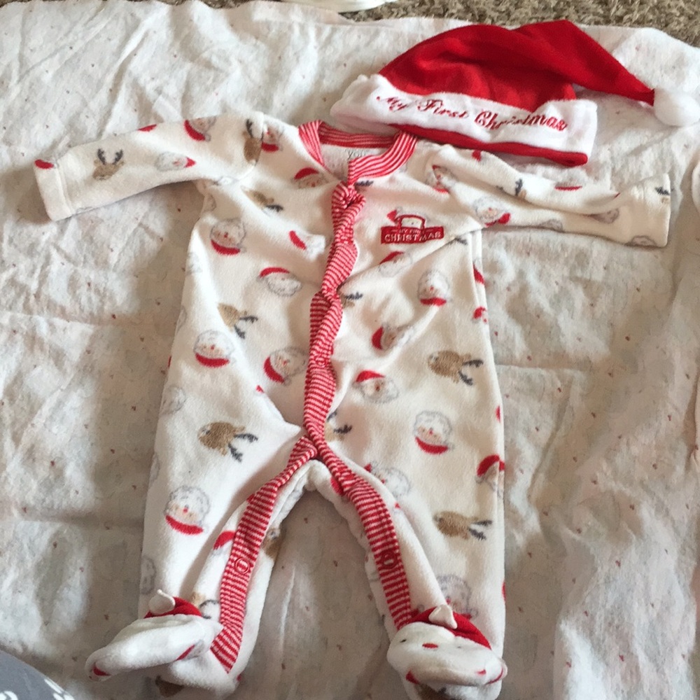 My first Christmas Pajamas and a Christmas hat.